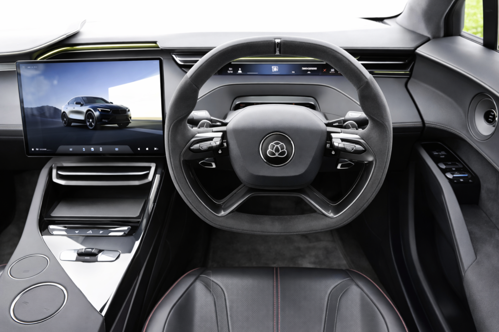 “Lotus Eletre luxury electric SUV interior featuring digital cockpit, large touchscreen infotainment system, premium steering wheel and modern dashboard design.”