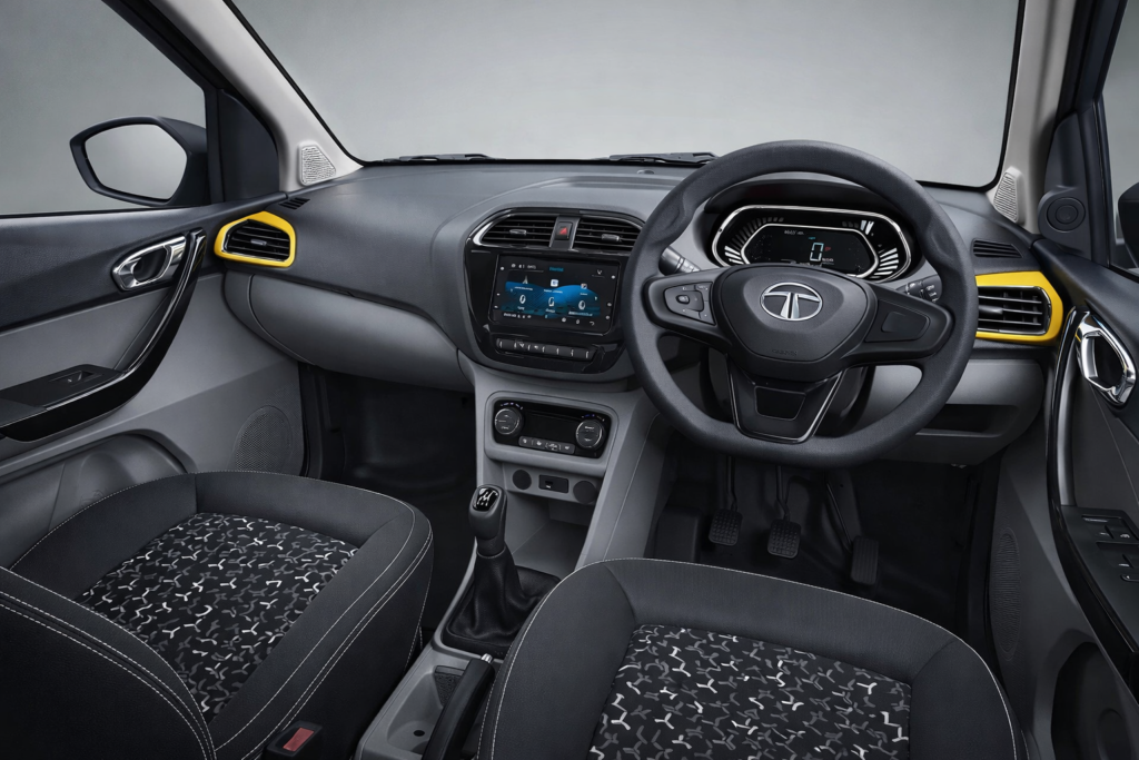 Tata Tiago car interior dashboard with touchscreen infotainment system and steering wheel design